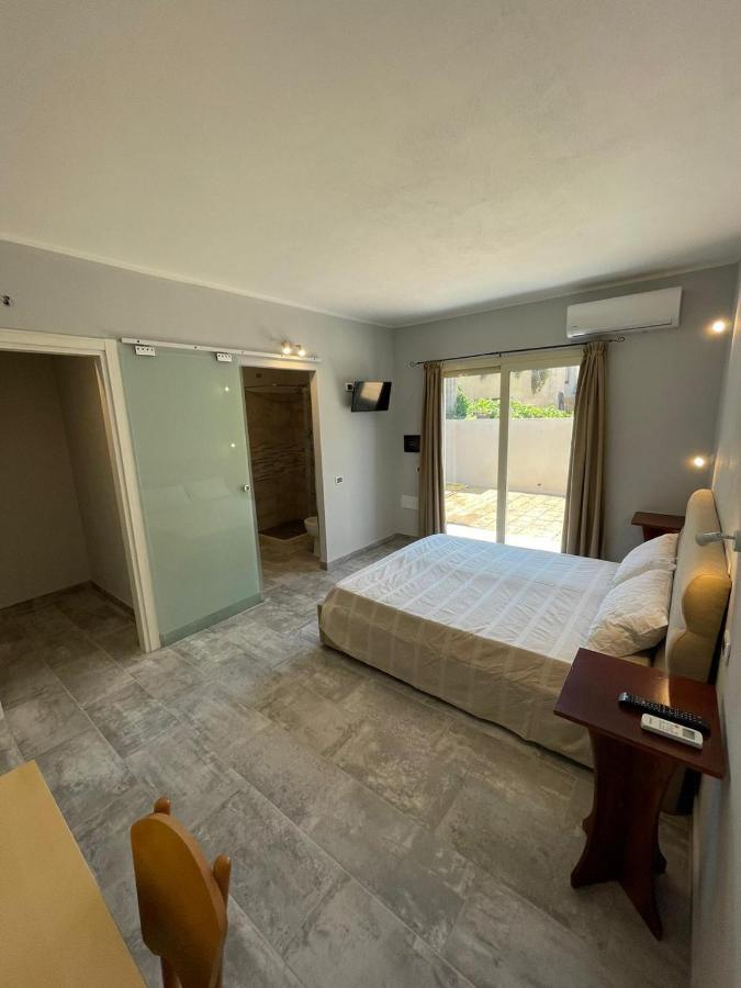 Casa Camere Pistis อัสเซมินิ ภายนอก รูปภาพ
