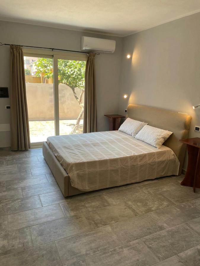 Casa Camere Pistis อัสเซมินิ ภายนอก รูปภาพ